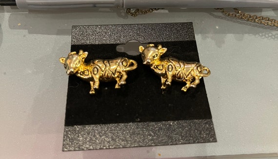 Gold bull pierced earrings - image 2