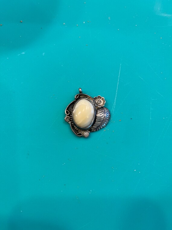 Navaho sterling pearl shell inset antique pendant