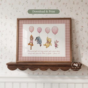 May include: A framed print featuring Tigger, Eeyore, Winnie the Pooh, and Piglet holding pink balloons. The text reads: Every good gift and every perfect gift is from above, coming down from the Father of lights - James 1:17. The frame has a pink gingham border.