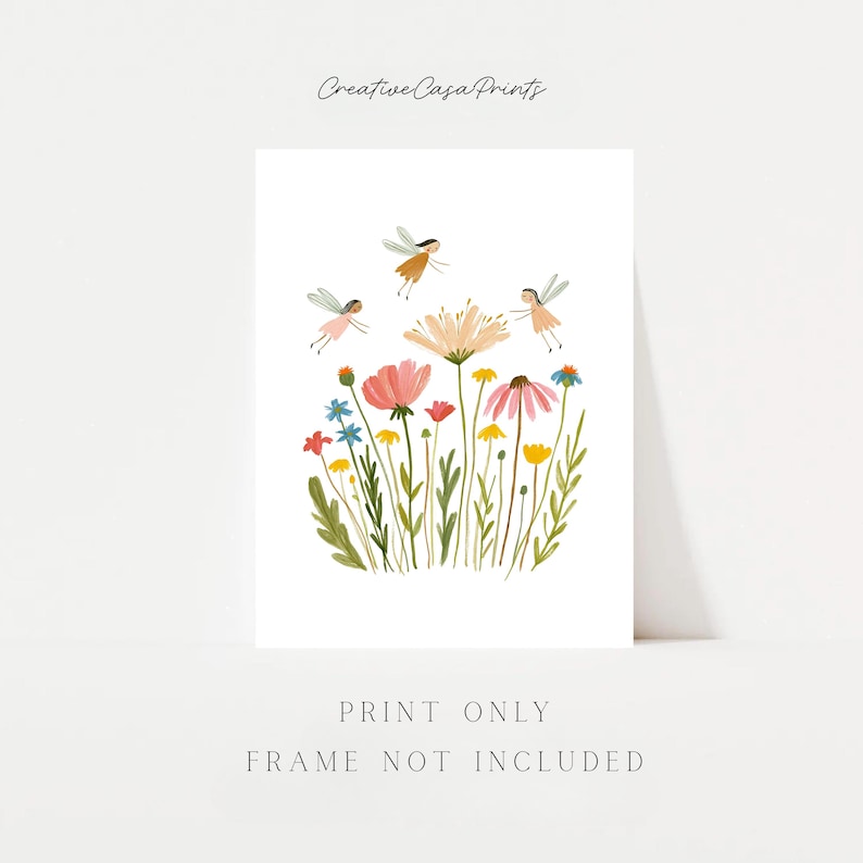 May include: A white art print featuring the text Creative Casa Prints at the top and Print Only Frame Not Included at the bottom. The center displays a colorful illustration of various wildflowers and three small winged figures in flight.