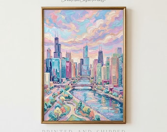 May include: An oil painting print of the Chicago skyline featuring thick, textured brushstrokes in pastel pink, blue, and purple hues. The city buildings and river are depicted under a cloudy sky, framed in a thin gold border with Creative Casa Prints text.
