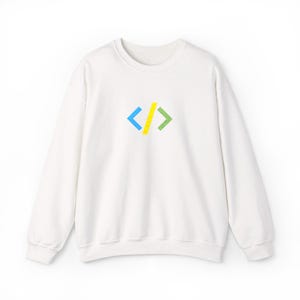 May include: A white long-sleeve sweatshirt featuring a centered graphic of a coding bracket symbol. The symbol consists of a light blue left angle bracket, a yellow forward slash, and a green right angle bracket, all printed on the chest.