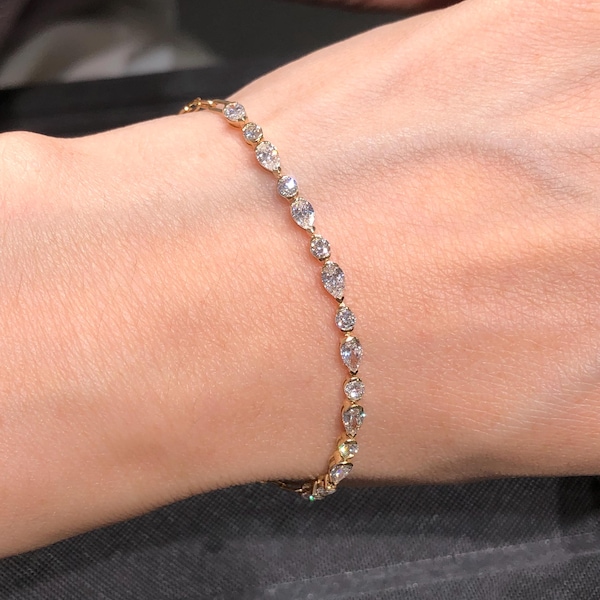 14K geelgouden peervormige armband met laboratoriumdiamant, een perfect jubileumcadeau voor haar.
