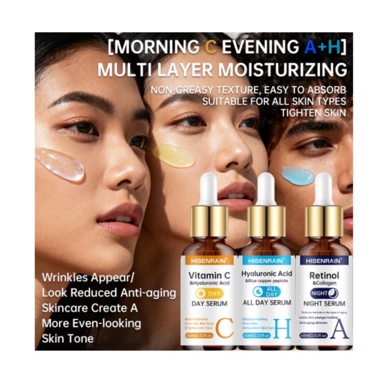 May include: Three amber glass dropper bottles labeled HISENRAIN Vitamin C Day Serum, Hyaluronic Acid All Day Serum, and Retinol Night Serum. Each bottle features a gold cap and white label with black text, standing against a background of faces.