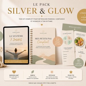 May include: A Silver & Glow kit featuring a tablet displaying the 7-day system, a spiral-bound notebook titled Mes Petits Pas Comptent, and various printed bonus cards including a meal guide, shopping list, and printable sheets on a beige background.
