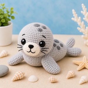 Schema PDF per realizzare un amigurumi di una foca neonata all'uncinetto, schema per un simpatico peluche a forma di foca all'uncinetto, amigurumi di animali marini, giocattolo marino, download immediato