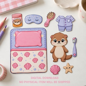 Könnte beinhalten: Ein Papierpuppen-Set mit einer braunen Otterfigur, einem Bett mit rosa Kissen und einer Decke mit Muschelmuster, einem violetten Schlafanzug, einer Schlafmaske, einer Haarbürste, einer Zahnbürste, einem Glas Leckereien, einer Muschel und einem Seestern. Text: DIGITAL DOWNLOAD NO PHYSICAL ITEM WILL BE SHIPPED.