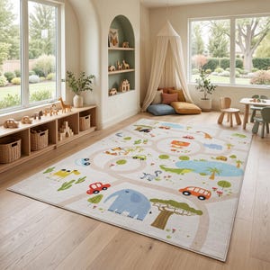 May include: A rectangular area rug featuring a light-colored background with a printed safari-themed road map. The design includes illustrations of a blue elephant, a green crocodile, a giraffe, various trees, cacti, and colorful toy cars.