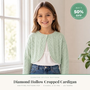 May include: A light green knit cropped cardigan featuring a diamond hollow stitch pattern, long sleeves, a round neckline, and a single button closure at the top. The text reads: Curated Stitch Pattern Diamond Hollow Cropped Cardigan.