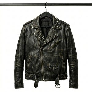 May include: A black distressed leather motorcycle jacket featuring silver-toned metal pyramid studs on the lapels and shoulders. The jacket includes an asymmetrical front zipper, three zippered pockets, one small flap pocket, and a buckled waist belt.