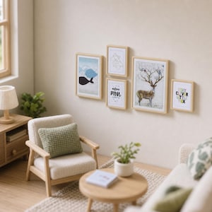May include: A miniature living room scene featuring a light wood armchair with a green textured pillow, a round coffee table with a small potted plant, and five framed wall art prints including a whale, a deer, and text graphics.