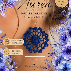 May include: A dark blue crochet earring featuring a circular, floral-inspired lace pattern. The design includes a central solid circle surrounded by two rows of openwork loops. A visible measurement line indicates a diameter of 6 cm. Text includes PATRON Auréa BOUCLES D'OREILLES au crochet, EXPLICATIONS DÉTAILLÉES, TUTORIEL PAS À PAS, and Fait main avec passion.