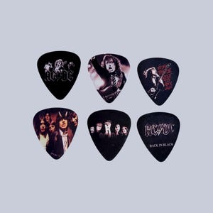 Set Di 7 Plettri Per Chitarra Tema Rock Anni '80 - Foto 2