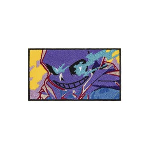 May include: A rectangular embroidered patch featuring a stylized character with a purple face, a wide grin, and glowing blue eyes. The design includes a yellow background, blue flame-like accents, and a thick black border surrounding the image.