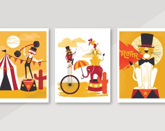 May include: Three colourful illustrations of circus performers. The first shows a strongman lifting a barbell, the second shows a clown riding a unicycle, and the third shows a lion wearing a top hat and bow tie.