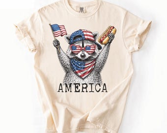 Comfort Colors®  4th of July Raccoon Shirt, Patriotic American Flag Tee, Retro USA Animal Shirt, America Raccoon Hot Dog Shirt, Kids T-Shirt