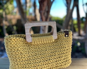 Handmade crochet bag with wooden handles