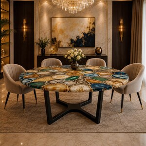 Polished agate tabletop with artistic gold seams and contemporary stand
Designer gemstone furniture centerpiece for luxury dining room interiors