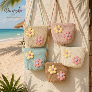 May include: Four crocheted crossbody bags in beige, light pink, light blue, and tan, each featuring two large, dimensional fabric flowers in yellow and pink with small blue or green centres, suspended by matching braided shoulder straps.