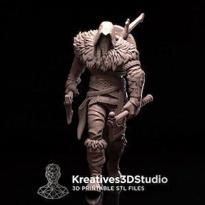 May include: A monochromatic 3D printed figurine of a hooded warrior wearing fur-lined armour, holding two axes, with a shield on the back. The base features the text Kreatives3DStudio 3D PRINTABLE STL FILES with a geometric head logo.