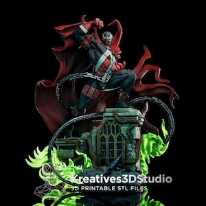 May include: A detailed figurine of a character in a black and white suit with a flowing red cape, standing on a stone structure with a gothic window. The base is surrounded by green flames and chains. Text reads Kreatives3DStudio 3D PRINTABLE STL FILES.