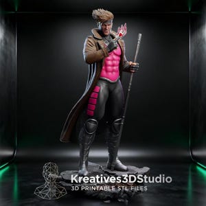 May include: A 3D printed figurine of a character with brown hair, wearing a brown trench coat over a pink chest piece and black pants. The character holds a glowing playing card and a long staff, standing on a rocky base with the text Kreatives3DStudio.