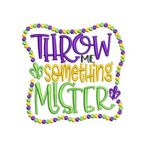 May include: Purple and green text that reads "Throw Me Something Mister" surrounded by a border of purple and yellow beads.