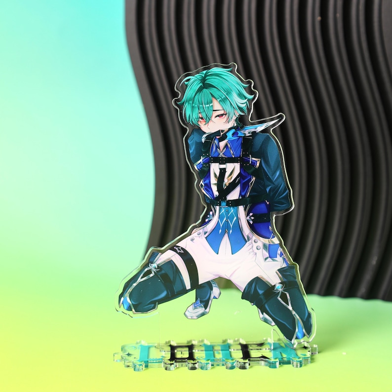 May include: An acrylic standee featuring an anime-style character with teal hair, wearing a blue and white outfit with black straps and dark blue thigh-high boots. The character is in a kneeling pose on a base with blue and black geometric patterns.