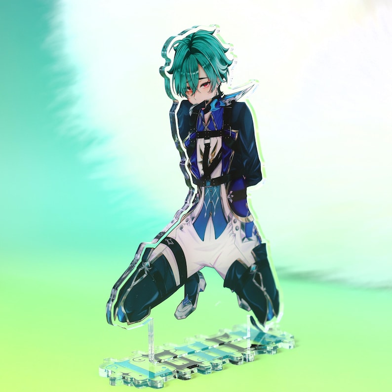 May include: An acrylic standee featuring an anime-style character with teal hair and red eyes. The character wears a dark blue and white outfit with black straps and is posed in a kneeling position. The figure is mounted on a clear rectangular base.