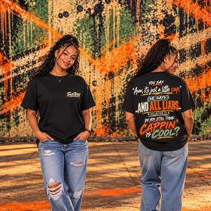 May include: A black short-sleeve t-shirt with a small logo on the front pocket area and a large graphic on the back featuring the text: YOU SAY: Aww, it's just a little cap. HE SAYS: AND ALL LIARS. REVELATION 21:8 DO YOU STILL THINK CAPPIN IS COOL?
