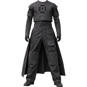May include: A dark gray ensemble featuring a short-sleeved cropped top with a central geometric patch, layered over a long-sleeved pinstriped shirt. The matching trousers include a flap pocket, quilted knee panels, and an attached long back panel.