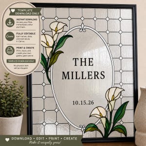 May include: A rectangular framed sign featuring a stained glass pattern with a central oval containing the text THE MILLERS and the date 10.15.26. White calla lilies with green leaves are illustrated on the left and bottom right corners.