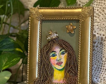 Woman with beaded hair collage