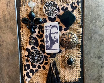 Mona Lisa mixed media framed art.