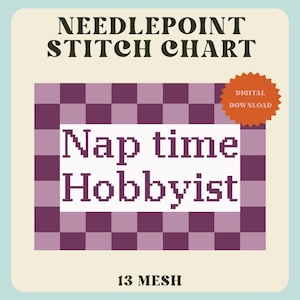 May include: A needlepoint stitch chart featuring a purple and light purple checkered background with a white rectangular center containing the pixelated text Nap time Hobbyist. An orange starburst shape includes the text DIGITAL DOWNLOAD.