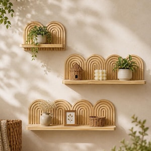 May include: Three light-colored wooden wall shelves featuring a repeating arched, ribbed back panel design. The top shelf has two arches, while the middle and bottom shelves each feature four arches, providing a structured display surface.
