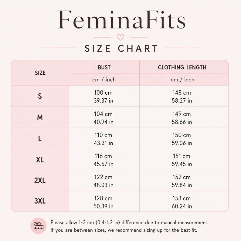 May include: A FeminaFits size chart table with a light pink background. The chart lists sizes S through 3XL with corresponding bust and clothing length measurements in both centimeters and inches. A note at the bottom mentions a 1-3 cm or 0.4-1.2 inch variance.