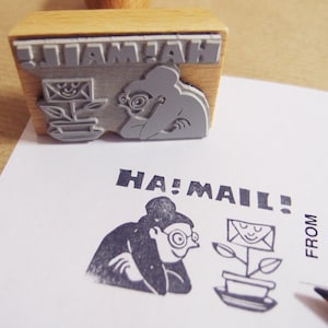 Carimbo "Ha! Mail" planta postal