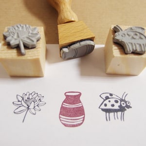 Set di timbri coccinella, ninfea e vaso