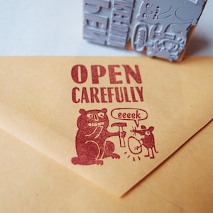 Stempel "Open carefully"  Vorsichtig öffnen