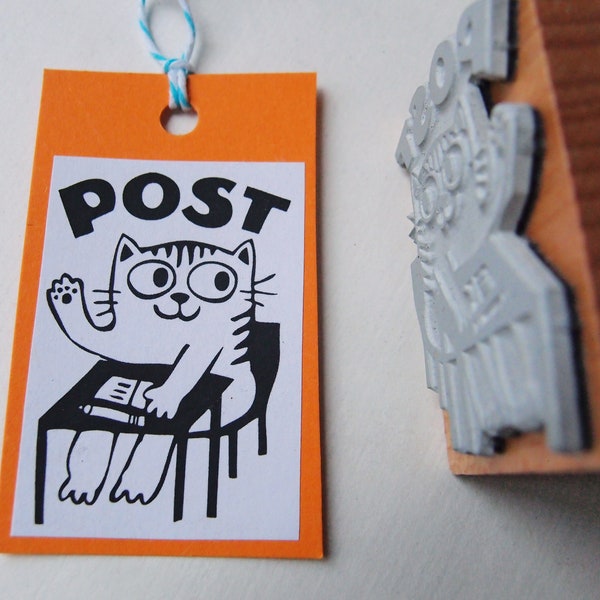 Stamp "Post" cat at the desk