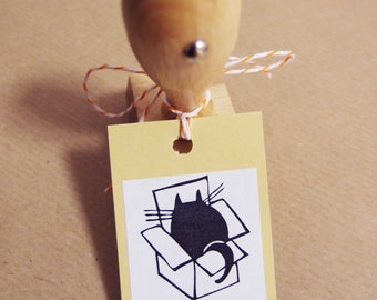 Sello "Por favor, reutilizar" gato en caja