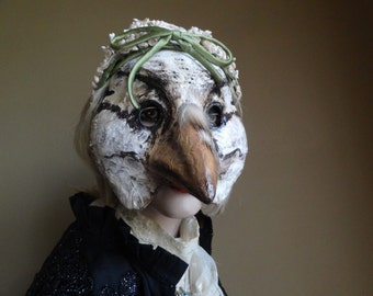 Paper mache forest bird mask