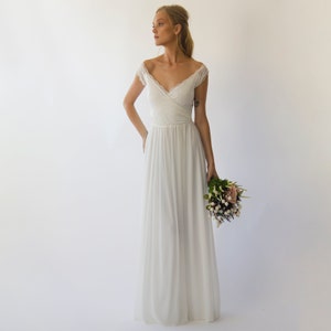 Bestseller Ivory Off the shoulder short sleeves wrap wedding dress #1302