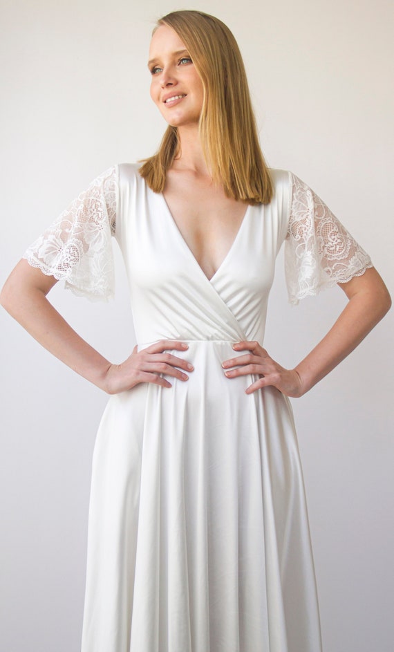 Ivory Satin Wrap Wedding Dress: Flutter Lace Sleeves, Maxi Gown with Pockets