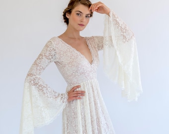 Boho Lace Bell Sleeve Wedding Dress: Deep V-Neck Blush Gown