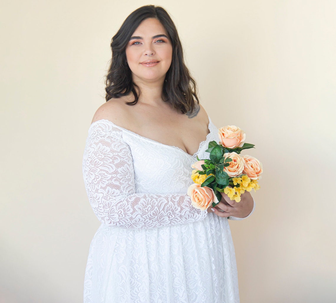 Ivory Off the shoulder lace wrap wedding dress with pockets image 1