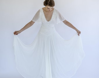 Vestido de novia de encaje bohemio: falda de gasa, mangas con vuelo y escote en V