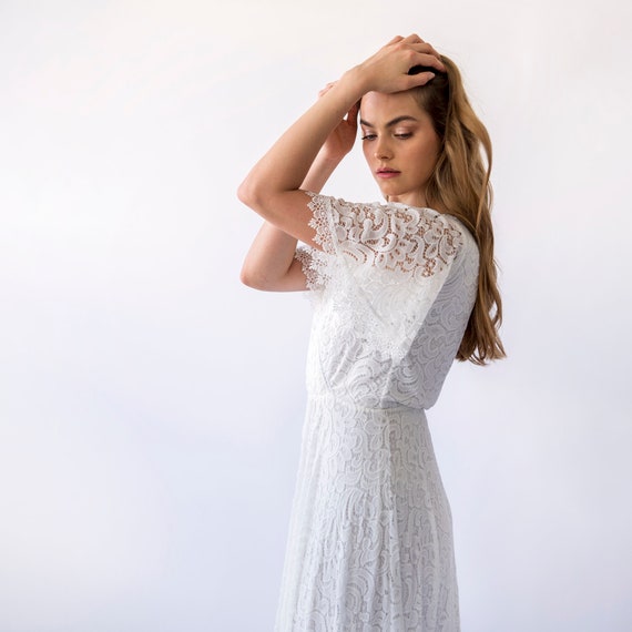 Ivory Lace Wedding Dress: Bohemian Wrap Gown with Butterfly Sleeves
