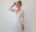 Ivory Lace Boho Wedding Dress: V-Neck Wrap, Puffy Sleeves #1365 product logo